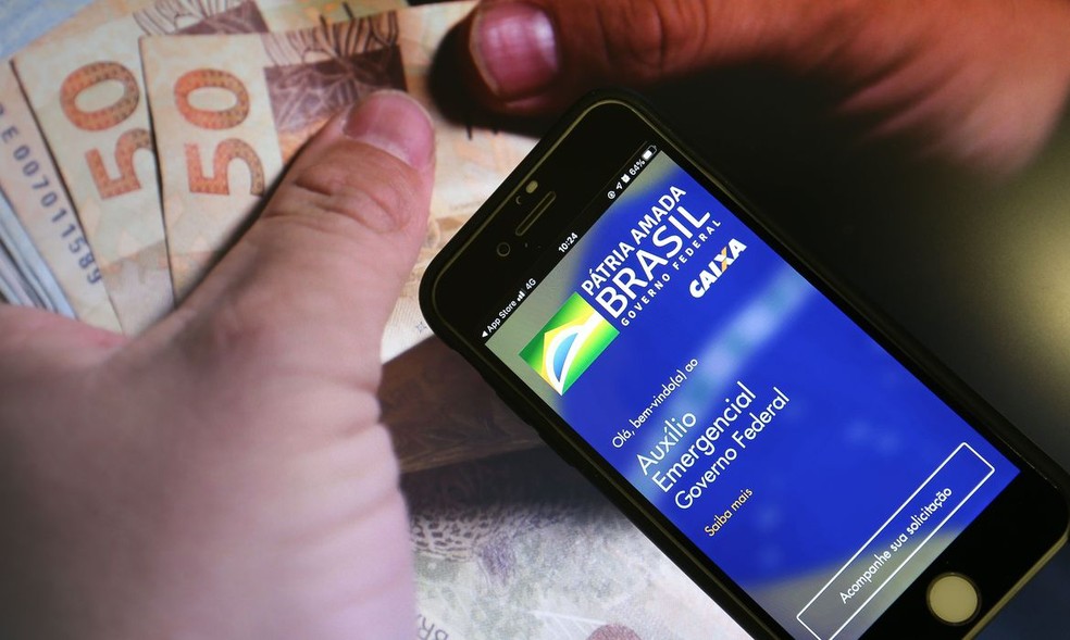 Cálculo do banco aponta que sem auxílio emergencial, haveria queda de 7,9% na massa ampliada — Foto: Marcello Casal Jr. / Agência Brasil